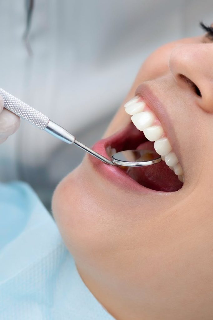 A detailed view of a dental check-up at a clinic in Belo Horizonte, Brazil.